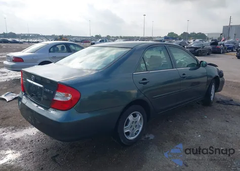 2003 Toyota Camry Le z USA, uszkodzony, nr VIN 4T1BF32K13U554339